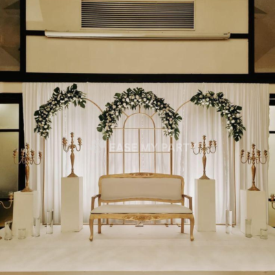 Modern Gold Grid Arch Engagement Backdrop with Botanical White Florals – Bangalore